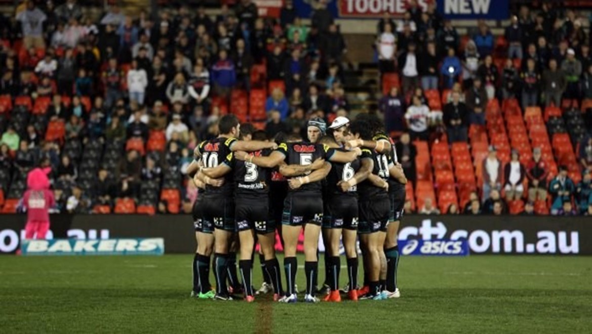 Digital Image by Robb Cox ©nrlphotos.com: The Panthers gather for 1 min silence in memory of james Segeyaro's father who passed away :NRL Rugby League - Round 24, Penrith Panthers V Melbourne Storm at Sportingbet Stadium, Monday August 25th 2014.