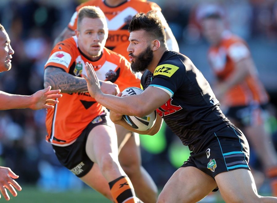 Digital Image Grant Trouville Â© nrlphotos.com : Josh Mansour attacks : NRL Rugby League Round 17 - Wests Tigers v Penrith Panthers at Leichhardt Oval sunday  June 6th  2014.