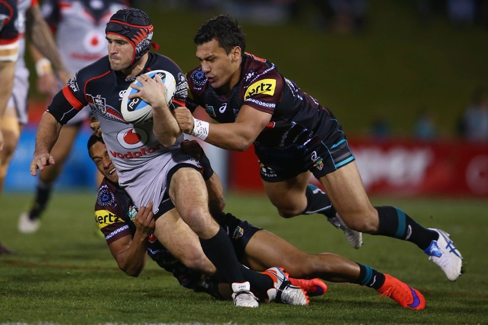 SYDNEY, AUSTRALIA - AUGUST 15:  Nathan Friend of the Warriors is tackled during the round 23 NRL match between the Penrith Panthers and the New Zealand Warriors at Pepper Stadium on August 15, 2015 in Sydney, Australia.  (Photo by Mark Kolbe/Getty Images)