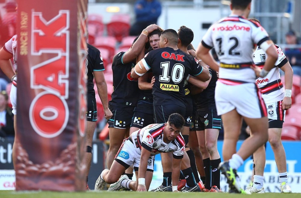 The Panthers NYC side celebrate a try against the Warriors in Round 23, 2015.