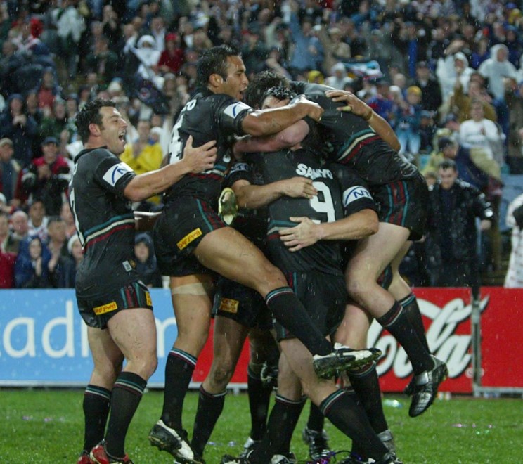Penriith celebrate Rooney's first try  - NRL Rugby League Grand Final, Penrith Panthers v Sydney Roosters at Sydney Olympic Stadium, Sunday October 5th 2003. Digital image by Colin Whelan, © Action Photographics