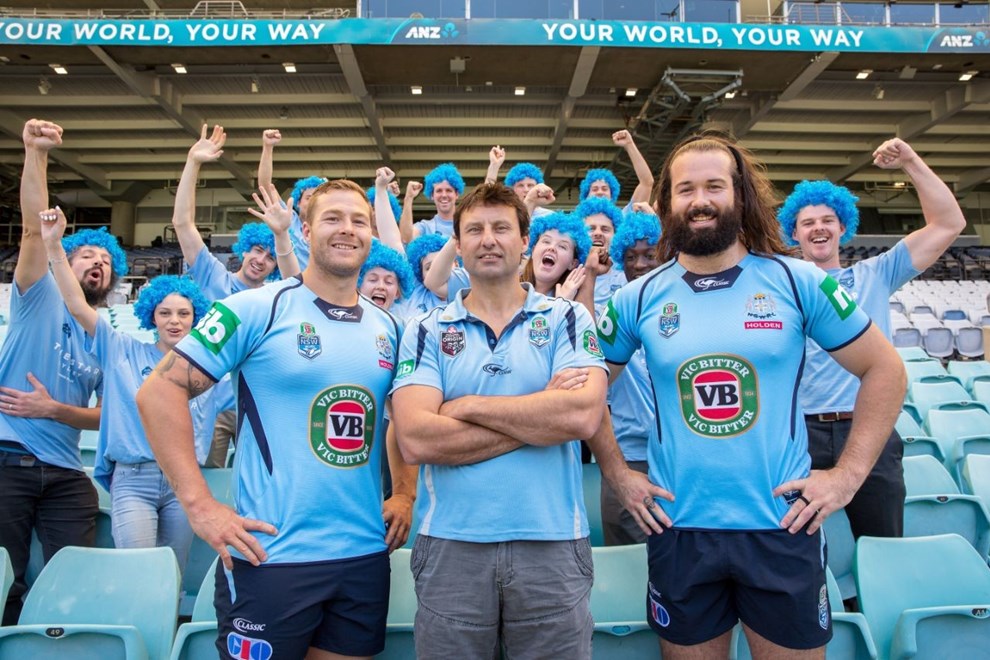 A small ensemble of Blatchys Blues fans and NSW players, Trent Merrin and Aaron Woods, plus coach Laurie Daley at ANZ Stadium. Pic bt NRL Photos Â© Robb Cox
