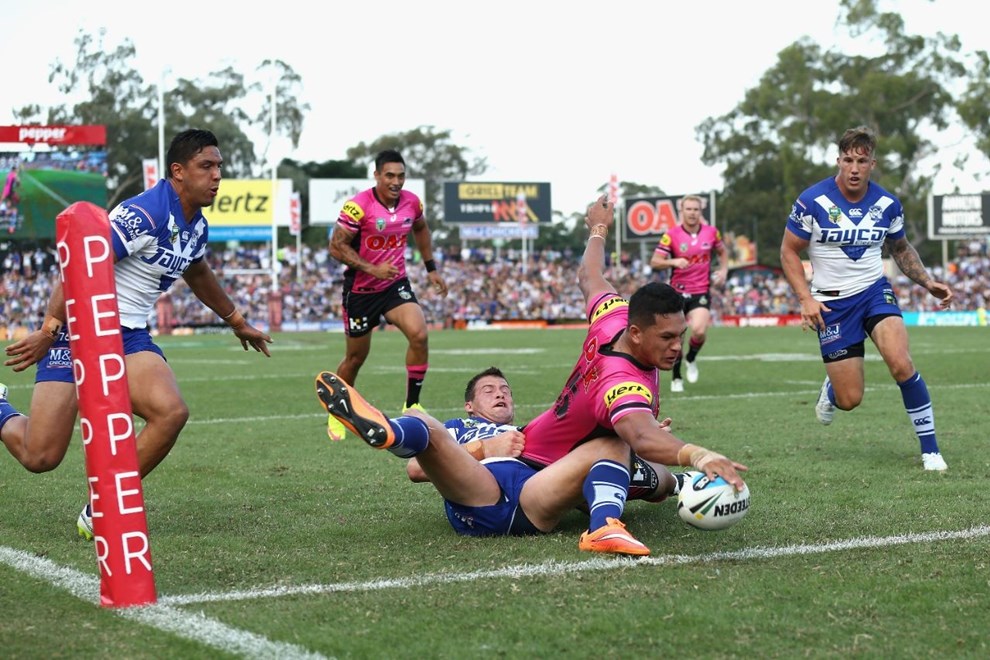 SYDNEY, AUSTRALIA - MARCH 08:  Dallin Watene-Zelezniak of the Panthers scores a try during the round one NRL match between the Penrith Panthers and the Canterbury Bulldogs at Pepper Stadium on March 8, 2015 in Sydney, Australia.  (Photo by Cameron Spencer/Getty Images)