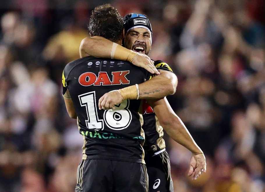 SYDNEY, AUSTRALIA - MARCH 19:  Te Maire Martin and Jamie Soward of the Panthers celebrate victory in the round three NRL match between the Penrith Panthers and the Brisbane Broncos at Pepper Stadium on March 19, 2016 in Sydney, Australia.  (Photo by Mark Metcalfe/Getty Images)