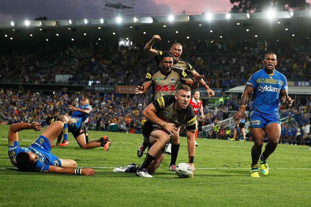 SYDNEY, NEW SOUTH WALES - APRIL 03: Bryce Cartwright of the Panthers scores the winning try during the round five NRL match between the Parramatta Eels and the Penrith Panthers at Pirtek Stadium on April 3, 2016 in Sydney, Australia.  (Photo by Brendon Thorne/Getty Images)