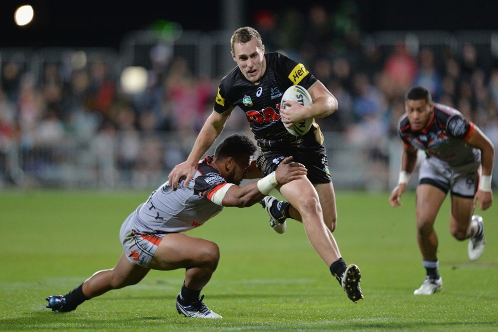 CHRISTCHURCH, NEW ZEALAND - MAY 14: Isaah Yeo of the Panthers is tackled during the round 10 NRL match between the Penrith Panthers and the New Zealand Warriors at AMI Stadium on May 14, 2016 in Christchurch, New Zealand.  (Photo by Kai Schwoerer/Getty Images)